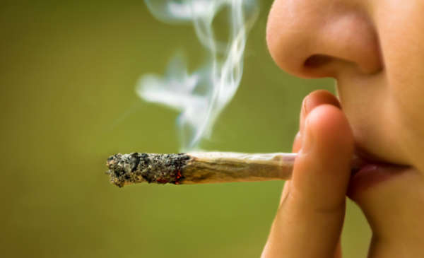 smoking a marijuana joint