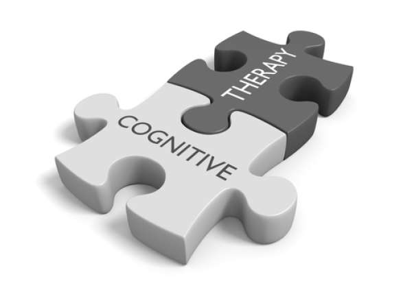 Two puzzle pieces fit together, saying Cognitive Therapyt