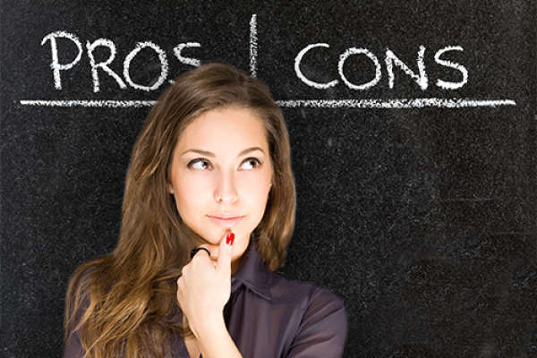 Woman in front of blackboard with the words Pros and Cons written, considering anxiety medication